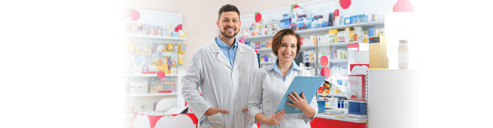 professional pharmacists in modern drugstore